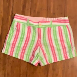 58. Lilly Pulitzer Shorts, Green & Pink Neon stripes on White background 
Sz 2
